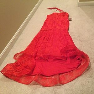 Beautiful RED. Prom or Special Occasion Dress   Size 16. Never Worn !